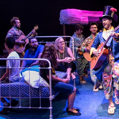 Matt Kahler, Steven Romero Schaeffer, Eduardo Xavier Curley-Carrillo, and Shawn Pfaustch move around the Promenade in H.M.S. Pinafore. (Photo: Teresa Castracane Photography)