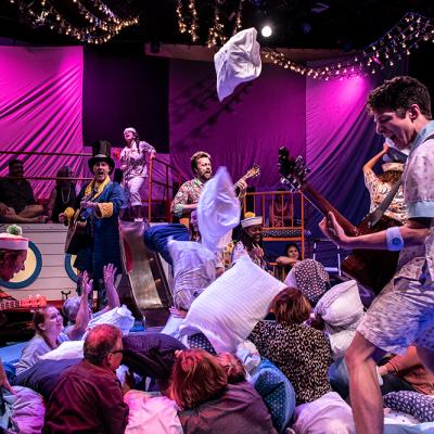 The cast interacts with the audience in the promenade during H.M.S. Pinafore. (Photo: Teresa Castracane Photography)