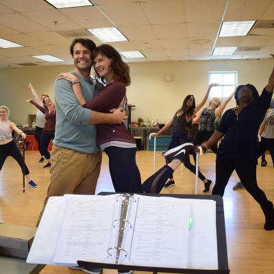 David Schlumpf (Buddy) and Patricia Hurley (Jovie) surrounded by a brilliant ensemble of elves!