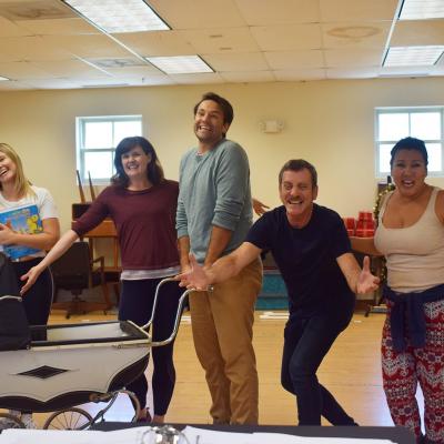 One big happy family! From left to right: Kevin McAllister (Santa), Lara Zinn (Mrs. Claus/Ensemble), Patricia Hurley (Jovie), David Schlumpf (Buddy), Bobby Smith (Walter Hobbs), and Janine Sunday (Emily Hobbs). This is from the final number of the show. 