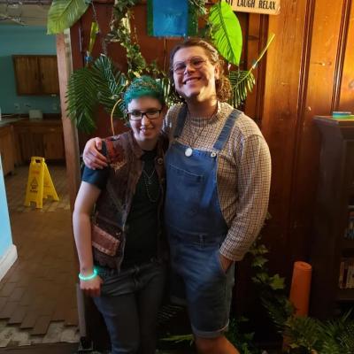 A photo of Theo and Turner in front of decorations at Theo's birthday party