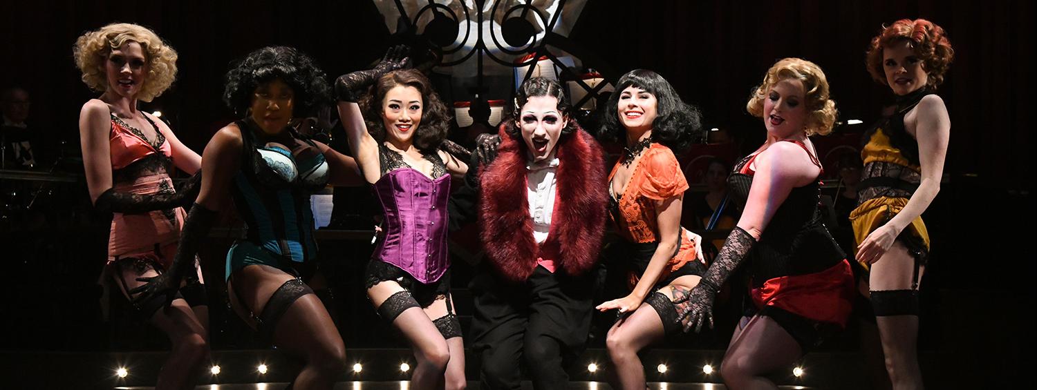 Mason Alexander Park (center) as the Emcee and the Kit Kat Girls in CABARET at Olney Theatre Center.