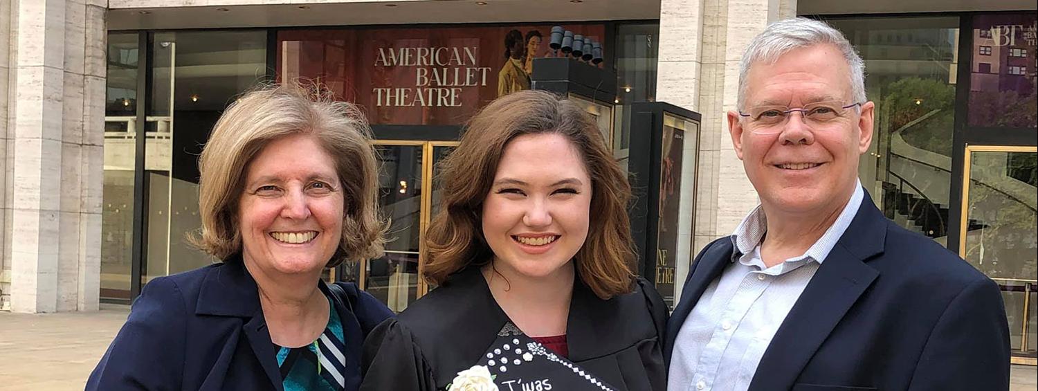 Meredith and her parents, Lorie and Chris, at graduation 