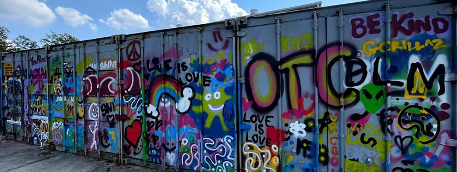 Spray paint art on an OTC shipping crate