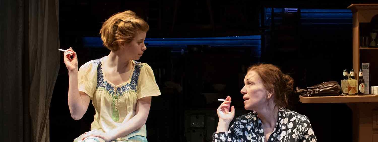 A production photo of Megan Graves (Amy) and Catherine Eaton (May) in OIL. Photo Credit: Teresa Castracane